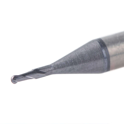 Close-up of carbide ball-nose end mill with TiAlN coating, 1/32 in diameter, 1/8 in shank, up-cut spiral.