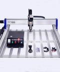 Shop Ready Heavy Duty 4 Axis 9090 Cnc Router For Wood Engraving Milling Drilling Machine with controller on worktable.