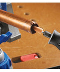 Top Shelf Rotary Tool Accessory Kit Loaded With Heavy Duty Micro Bits For Cutting Engraving Grinding Sanding And Polishing Comes With A Solid Storage Case Built For Weekend Hobby Hustle Backyard Fixes And Creative Project Grinds. Copper pipe being ground with rotary tool bit.