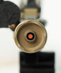 Front view of firearm barrel with 22 Cal Bore Alignment Rod Carbon Fiber With Protective Case And Clear Storage Tube installed