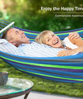 Couple relaxing in Portable Camping Hammock With Upgraded 320G Canvas Fabric For Super Comfy Relaxation 550Lb Weight Capacity