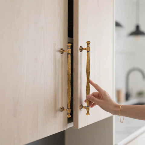 Antique Brass Cabinet Pulls 5 Inch Center To Center Zinc Alloy Solid Drawer Handles for Bedroom and Kitchen installed on light wood cabinet