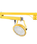 Tough As Nails 30W LED Loading Dock Light With 43 Inch Swivel Arm mounted on a wall for bright illumination in a workshop.