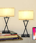 Set Of 2 Modern Table Lamps With 3 Way Dimmable Touch Control, Built In USB Ports And Outlet on bedside with books and phone