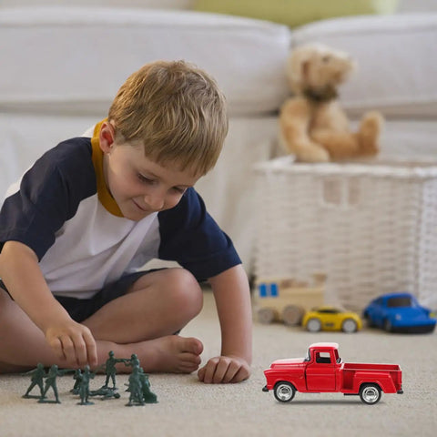 Child playing with 4.72 Inch Miniature Pickup Truck Model Alloy Metal Figurine For Collectors Who Dig, in room with toy soldiers.