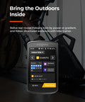 Smart GPS Bike Computer With A 3.3 Inch Color Touchscreen displaying indoor ride options with bike trainer in background.