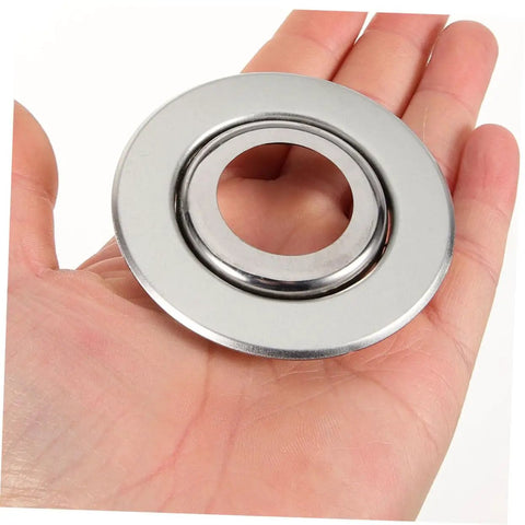 Hand holding a stainless steel fire sprinkler escutcheon plate, 6.7 cm square for home or office sprinkler head upgrade.