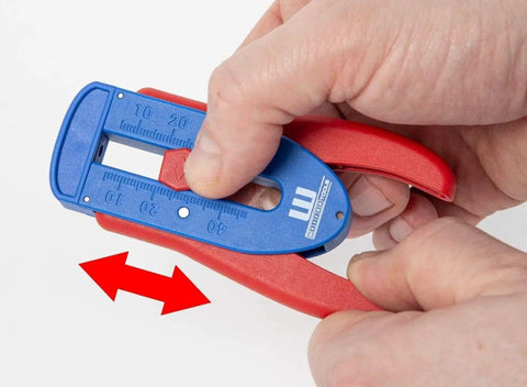 Hand holding Precision Wire Stripper S Built For Righties And Lefties With Infinitely Adjustable Stripping Range From 0.12 mm To 0.8 mm Compact Ergonomic Tool Non Slip Grip For Thin Conductors And Wires showing adjustment mechanism