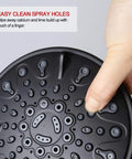Close-up of matte black 6-spray shower head from Matte Black 3 Handle Tub And Shower Faucet Set showing easy clean spray holes.