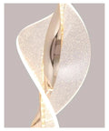 Close-up of Dope Modern Nordic Staircase Chandelier's sleek undulating design with glittering surface details