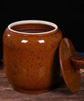 Big Boy Ceramic Rice Jar With Rattle Proof Lid Heavy Duty Porcelain Kitchen Dispenser To Keep Your Grains Coffee Flour And Nuts Fresh Vintage Brown Bulk Pantry Vault with lid on, showing rich brown speckled finish.