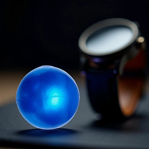 Blue Rubber Ball Watch Case Back Opener For Battery Replacement, Non-Marking Friction Ball Tool, beside a watch