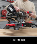 Person holding Compact Seven And One Quarter Inch Sliding Miter Saw With Ten Amp Motor Single Bevel LED Shadow Line Built For Tight Spaces
