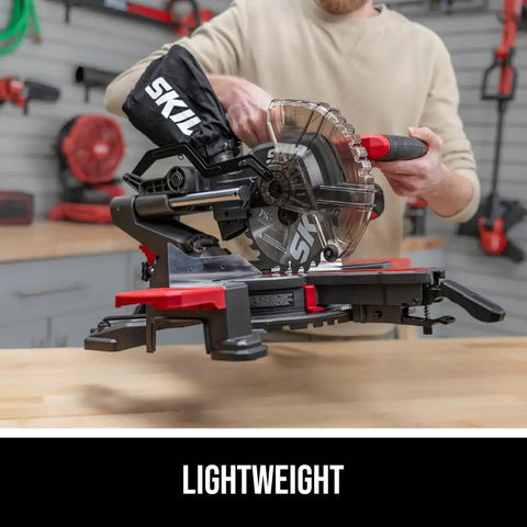 Person holding Compact Seven And One Quarter Inch Sliding Miter Saw With Ten Amp Motor Single Bevel LED Shadow Line Built For Tight Spaces