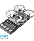Meteor75 Pro Brushless Whoop Quadcopter on scale at 25.59g with 45mm 3-blade props and O4 Air Unit Matrix 1S 3 in 1 HD FC