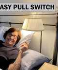 Over The Bed Reading Lamp With Soft Cream Pleated Fabric Shade And No Fuss Easy On Off Pull Cord Eye Friendly Bedside Light in use