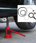 Score This Dope 17 Piece Bottle Jack Repair Kit For 3 Ton Hydraulic Vertical Lift With Ram Piston Pump seals and gaskets displayed with a red bottle jack.