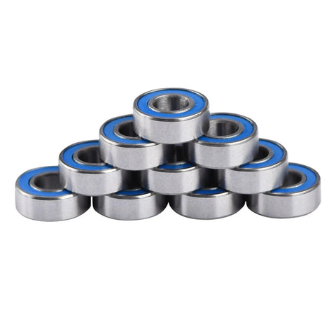 Pile of flanged 5x11x4mm deep groove ball bearing 2RS steel with double shield seals for rail track linear motion systems.