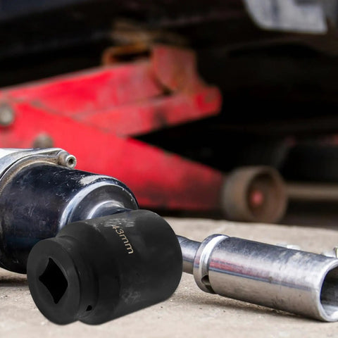 Heavy Duty Impact Socket Set With Universal Joint Adapter And Swivel Sock 3 4 Drive metric socket on workshop floor