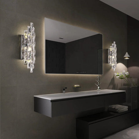 Crystal Chrome Wall Sconces for Living Room Bedroom Bathroom Hallway Staircase Lighting Indoor Vanity Wall Mount Lamps with Clear K9 Crystals, mounted on bathroom wall beside mirror