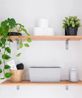 Heavy Duty 4X4 Inch L Brackets Solid Stainless Steel Corner Supports Rust Proof Shelf Braces Brushed Finish 4 Pack For Home Shelves used to hold floating shelves with plants and decor.