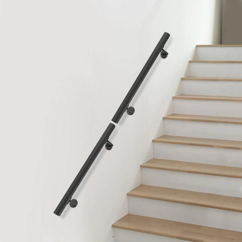 Rock Solid Wall Mounted Stair Handrail Crafted From Premium Black Stainless Steel Features A Sleek Modern Cylindrical Profile Built Tough To Handle Heavy Daily Traffic On Indoor Steps Without Skipping A Beat.