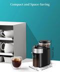 Flat Burr Coffee Grinder With 28 Custom Grind Levels For Espresso And Drip Brews displayed on a countertop with coffee cups.