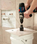 Using Heavy Duty 11 Piece Diamond Hole Saw Assorted Set for Concrete and Tile with a power drill on a tile.