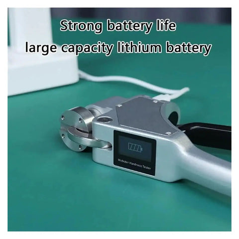 Heavy Hitter Digital Hardness Meter With Quick Read Display For Fast Metal Gauging 0.6 To 8 Mm Range showing battery indicator on portable tester.