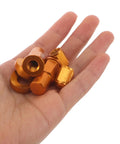 Aluminum Motorcycle Valve Stem Lock Nut Spacer Kit With High Strength Bolts And Washers, Vibration Resistant Leak Prevention Secure Tire Seal Replacement Set Compatible With Multiple Motorcycles, orange aluminum parts in hand