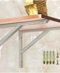 Rock Solid Heavy Duty Angle Brackets for Wall Shelves supporting a wooden shelf, showcasing steel brackets and screws.