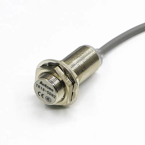 Compact Motion Sensor And Inductive Proximity Switch TR18-5AO For Precise Object Detection In Robotics, Automation, Industrial Equipment, And DIY Projects For Makers And Tech Enthusiasts. Metal cylindrical inductive sensor with cable