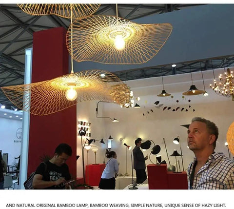Handcrafted Rattan Pendant Light Industrial Farmhouse Ceiling Lamp Easy Peasy Install Super Solid Braided Shade in display.