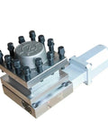 Close-up of Top Shelf 4 Station Cnc Electric Tool Turret Ultra Compact Industrial Automation Tool Holder with motor and bolts
