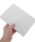 Hand holding a sheet from 20pcs White Corrugated Cardboard Sheets 8x6 Inches 1.5mm Thick Shockproof Packing Inserts For Mailing