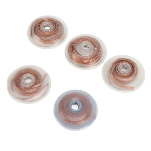 Five rolls of Pro Grade Desoldering Wick Copper Solder Removal Tool 5 Pack High Efficiency Solder Braid on plastic spools.