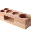 Buttery Smooth Espresso Tamper Station Crafted From Solid Natural Wood 58mm Multifunctional Coffee Bar Organizer And Drip Tray side view showing cup slots and handle