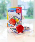Interactive FM Radio Kit For Kids 8 Plus Hands On STEM Electronics Project in packaging with assembled circuit on table.