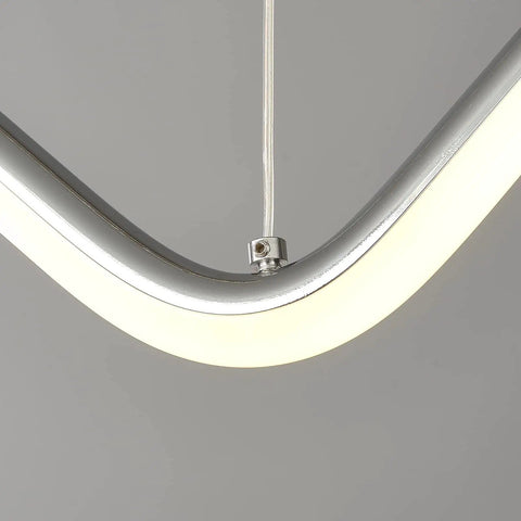 Close-up of Slick Chrome LED Dimmable Linear Wave Pendant Lights For Kitchen Island And Dining Room Hanging 47.2 Inch Chandelier
