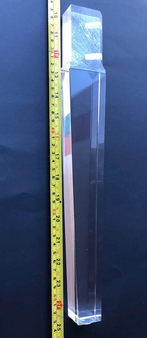 Clear Lucite 15 Inch Tapered Furniture Leg next to measuring tape, part of 4 Piece Set For Benches Cabinets And Tables Slick Modern Replacement