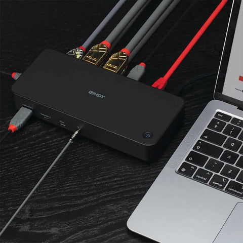 Top Tier Universal Laptop Docking Station With Triple 4K Displays And Display Port Outputs Usb C And A Hybrid Hub connected to laptop.