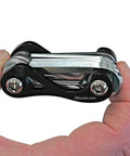 TL110 Scuba Multi Tool for Divers, Stainless Steel Bronze Build, folded view held in hand, compact dive gear for easy transport.