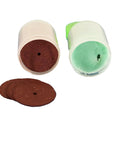 Two cylindrical containers from Must Have 100 Piece Rotary Tool Accessory Kit For Dremel And Other Rotary Tools with discs.