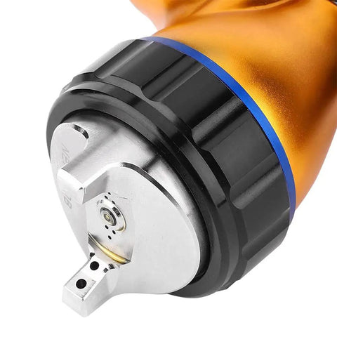 Close-up of Heavy-Duty 1.3mm Gravity Paint Sprayer nozzle showing fine atomization for precise detail work.