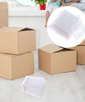 Fifty Pack Small Bubble Mailers 10x10 Plus 3cm Self Seal Padded Envelopes with cardboard boxes in background