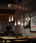 10 Light Rustic Wood Chandelier Pendant Light with Adjustable Suspension Chain in dining area setting.