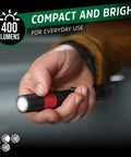 Hand holding Rechargeable Pen Light Flashlight X 400 Tiny But Mighty Pocket Size Workhorse Ultra Bright LED
