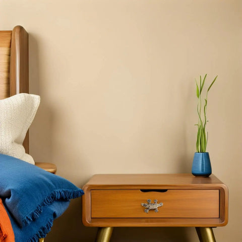 Vintage Brass Duckbill Cabinet Door Pull Handle Single Hole Design on wooden bedside table with blue vase