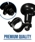 Close-up of Classic Black Steering Knob Spinner Universal Fit Grip Handle for quick car turns with ABS plastic design.