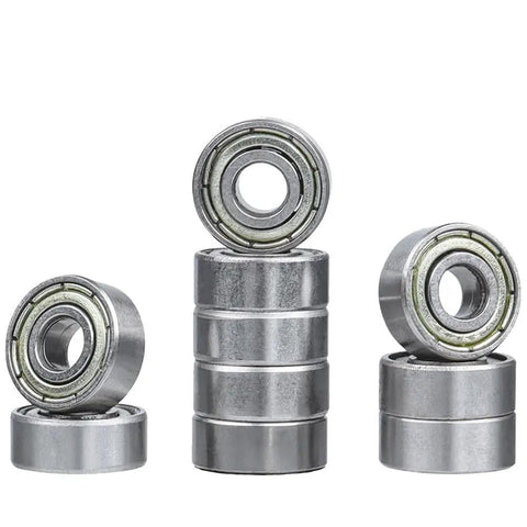Set of 2 router bit bearing kit top mounted bearings with three sixteenths inch inner and three eighths inch outer diameter on display